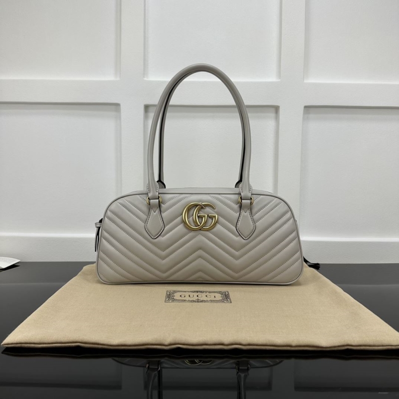 G*u*i top handle bags